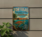A vintage-style sign for the Tortugas Ecological Reserve in South Florida, featuring a large turtle swimming in the ocean and a palm tree in the background.