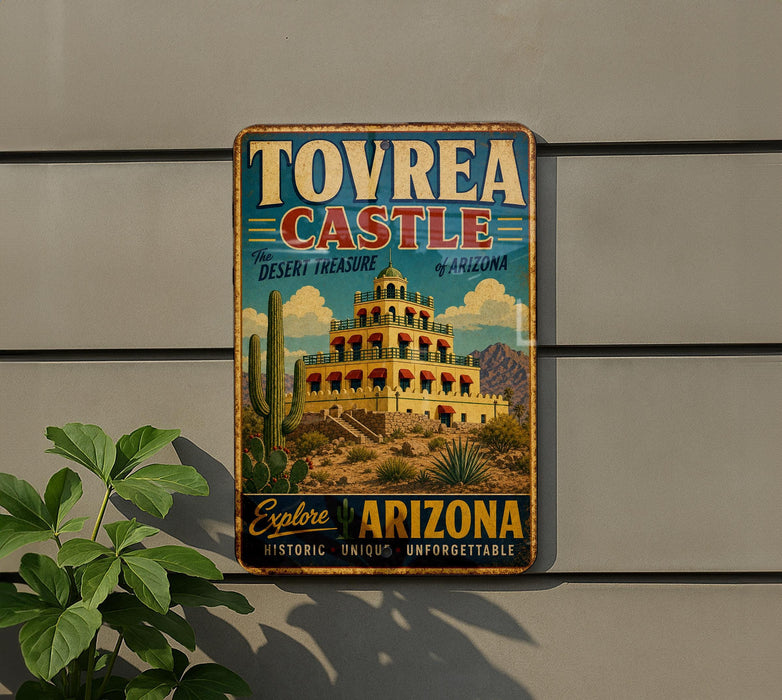 A vintage-style metal sign for Tovrea Castle, a desert treasure in Arizona, featuring a colorful illustration of the castle and desert landscape.