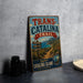 A vintage metal sign for the Trans-Catalina Trail, featuring a scenic landscape with mountains, a river, and a signpost.