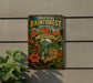 A vintage-style metal sign with an illustration of an orangutan, a tiger, and a waterfall, advertising the "Rainforest Heritage of Sumatra Indonesia".