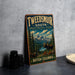 A vintage-style metal sign for Tweedsmoor South Provincial Park in British Columbia, featuring a moose and a scenic mountain landscape.
