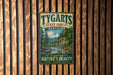 A vintage-style metal sign for Tygart State Forest in Kentucky, featuring a scenic image of a forest and a river.