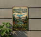 A vintage metal sign for the Uinta-Wasatch-Cache National Forest in Utah, featuring a moose and a mountain landscape.