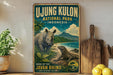 A vintage-style poster advertising the Javan Rhino National Park in Indonesia, featuring a rhinoceros and a lizard in a lush, tropical setting.