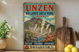 a vintage-style poster of Unzen, Japan, depicting a scenic landscape with a mountain and steam vents.