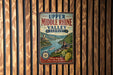 A vintage-style metal sign with the text "Upper Middle Rhine Valley Germany" displayed on a wooden wall.