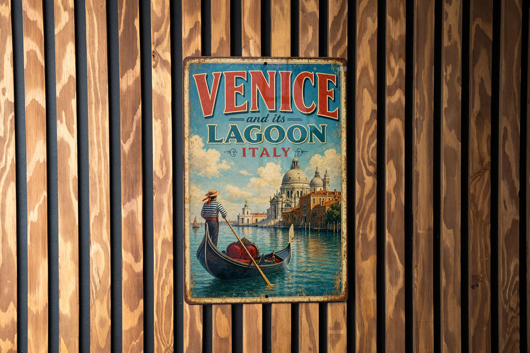 A vintage metal sign with the text "VENICE and its LAGOON ITALY" and an illustration of a gondola on the water, set against a wooden background.
