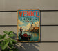 A vintage metal sign with the text "VENICE and its LAGOON ITALY" and an illustration of a gondola on the water, with a domed building in the background.