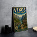 A vintage-style metal sign for Vikos Aios Park in Greece, featuring a scenic mountain landscape with a river and bridge.