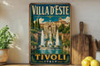 A vintage-style poster of the Villa d'Este in Tivoli, Italy, featuring a fountain and a building with a dome.