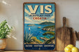 A vintage-style metal sign with the text "VIS ARCHIPELAGO PARK - CROATIA" and a scenic illustration of a coastal landscape with a sailboat, palm trees, and mountains.