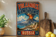 A vintage-style sign advertising "Volcanoes of Kamchatska" in Russia, featuring a painting of a volcano with a mountain range in the background.
