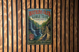 A vintage metal sign for Watkins Glen Gorge Trail in New York, featuring a scenic image of a waterfall surrounded by lush greenery.