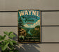 A vintage-style metal sign for Wayne National Forest in Ohio, featuring a scenic landscape with a river, cliffs, and pine trees.