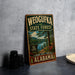 A vintage-style metal sign for Weoguffka State Forest in Alabama, featuring a scenic landscape with a lake and mountains.