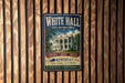 A vintage-style metal sign for the White Hall State Historic House in Kentucky, featuring an illustration of the historic building and text promoting the state park.