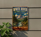 A vintage-style metal sign for the White River National Forest in Colorado, featuring a scenic mountain landscape with a river and pine trees.