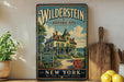 A vintage-style metal sign advertising Wildstein Historic Site in New York, featuring a large illustration of a house and a path leading to the building.