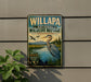 A vintage-style metal sign for the Willapa National Wildlife Refuge in Washington, featuring an illustration of a crane and a lake surrounded by trees.