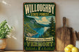 A vintage-style metal sign for Willoughby State Forest in Vermont, featuring a scenic mountain landscape with a lake and pine trees.