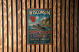 A vintage Wisconsin shipwreck coast sign is displayed on a wooden wall.