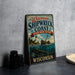 A vintage-style metal sign for Wisconsin's Shipwreck Coast, featuring a lighthouse and a shipwreck, is displayed on a gray countertop.