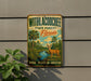 A vintage-style metal sign with a deer illustration and text promoting the Withlacoochee State Forest in Florida, advertising nature, recreation, and adventure.