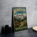 A vintage-style metal sign for the Wonderland Trail in Washington, featuring a mountain landscape and a trail sign.
