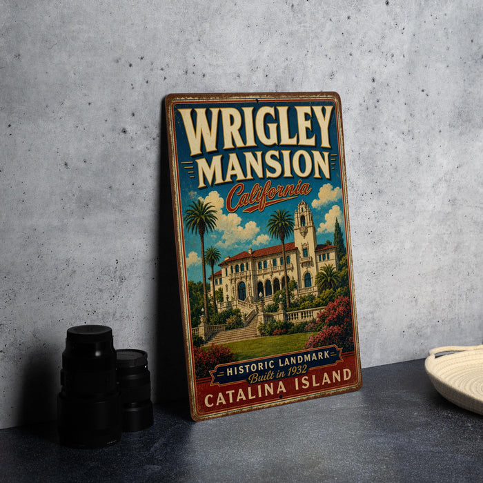 A vintage-style metal sign for Wrigley mansion in California, featuring an illustration of the mansion and palm trees.