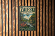 A vintage metal sign for Zaleski State Forest in Ohio, featuring a scenic landscape with a waterfall and pine trees.