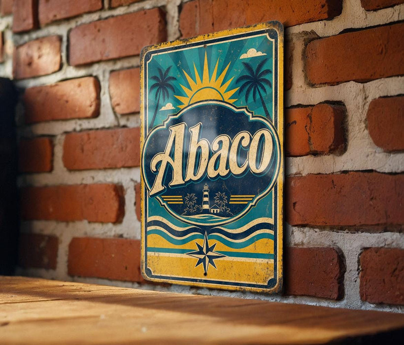 A vintage Abaco sign is displayed on a brick wall, featuring a sun and palm tree design.