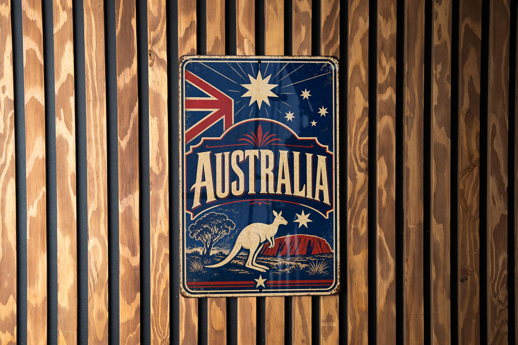 A vintage-style metal sign with the word "AUSTRALIA" prominently displayed, featuring a kangaroo and the Australian flag.