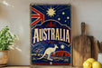A vintage-style metal sign with the word "AUSTRALIA" prominently displayed, featuring a kangaroo and a night sky with stars. The sign is placed on a shelf next to a wooden cutting board and some lemons.