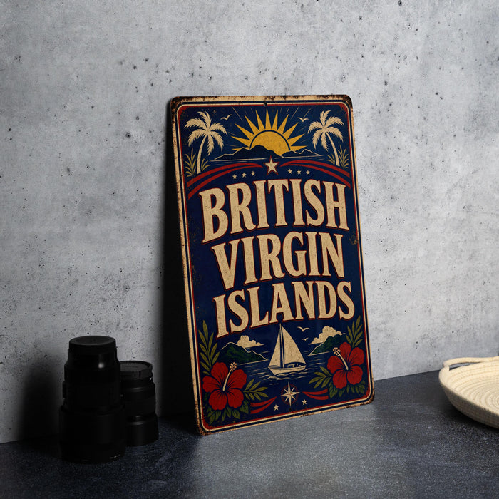 A vintage-style sign for the British Virgin Islands, featuring a sun and palm tree design, is displayed on a gray countertop next to a stack of black camera lenses.