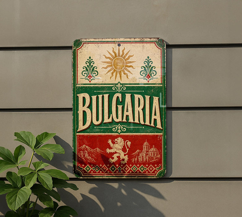 a vintage-style sign with the word "Bulgaria" prominently displayed, along with decorative elements such as a sun and a lion. The sign is mounted on a wall, and there is a plant visible to the left of the sign.