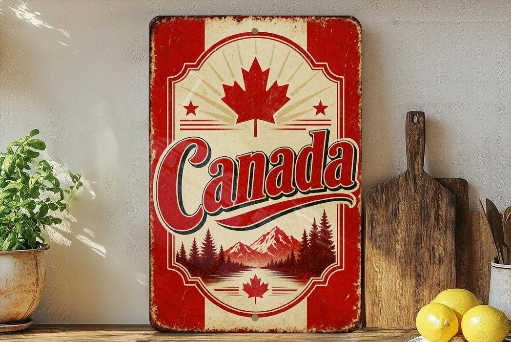 A vintage-style metal sign with the word "Canada" prominently displayed, featuring a maple leaf and mountain landscape. The sign is placed on a shelf next to a wooden cutting board and a potted plant.
