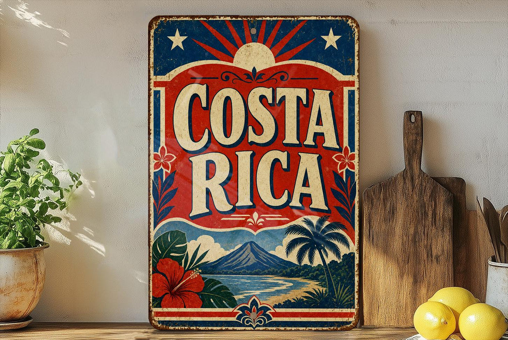 A vintage-style sign with the text "COSTA RICA" displayed prominently, featuring a tropical landscape with palm trees, mountains, and a sunburst design. The sign is placed on a shelf next to a wooden cutting board and a potted plant, creating a rustic and inviting atmosphere.