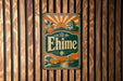 A vintage-style metal sign with the word "Ehime" displayed prominently in the center, surrounded by various decorative elements such as a sun, flowers, and a bridge.