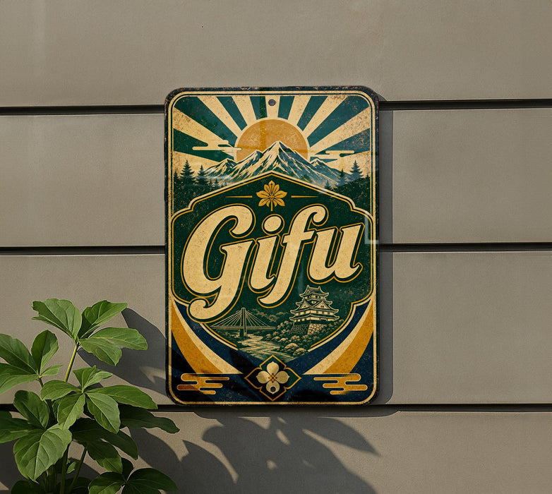 A vintage-style sign with the word "Gifu" displayed prominently, featuring a mountain landscape and sunburst design.