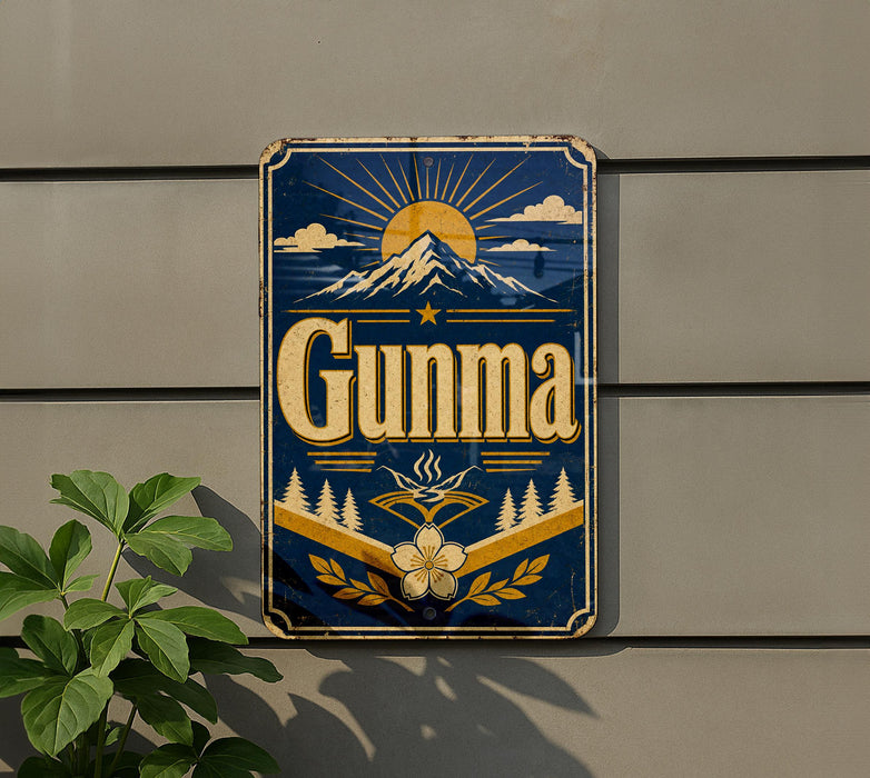 a vintage-style sign with a mountain landscape and sun design, mounted on a wall.