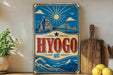 A vintage-style metal sign with a blue background and a castle illustration, along with a bridge and sun, is displayed on a shelf next to a wooden cutting board and some lemons.