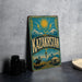 A vintage-style metal sign with the word "Kazakhstan" prominently displayed, featuring a sun and mountains in the background.