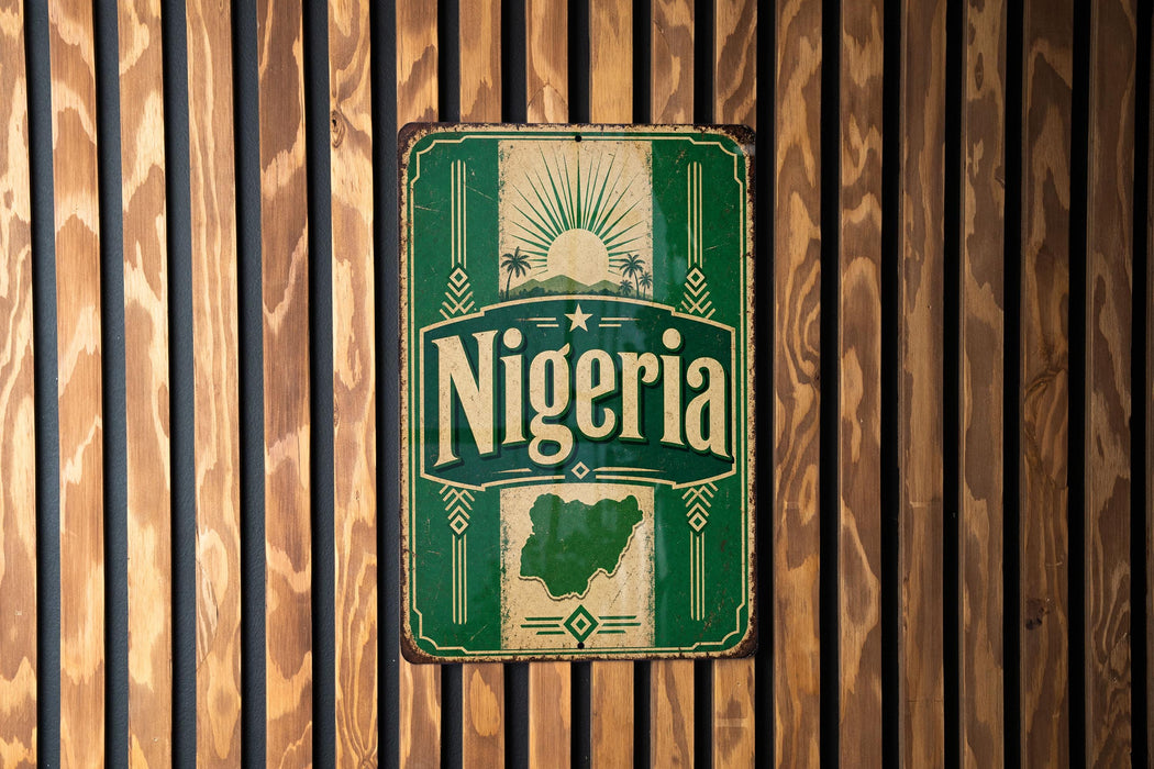 A vintage-style metal sign with the word "Nigeria" prominently displayed, featuring a map of Nigeria and decorative elements.