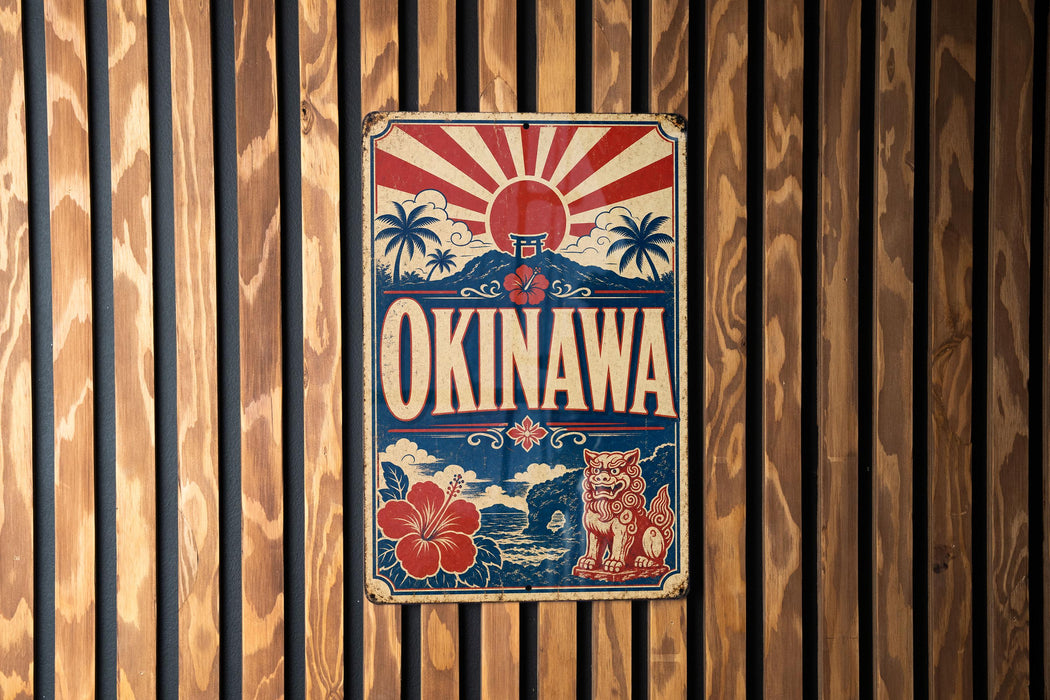 A vintage-style sign for the city of Okinawa, featuring a red and white sun design and a Japanese-style lion.
