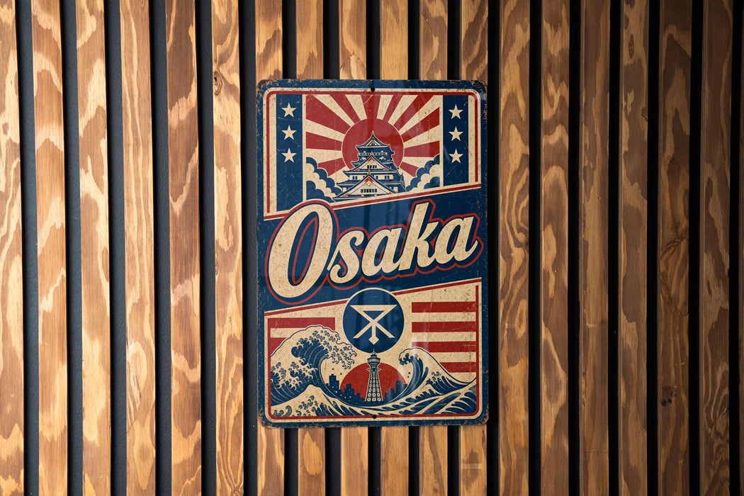 a vintage-style metal sign with the word "Osaka" prominently displayed, along with a wave and a castle-like structure.