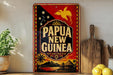 A vintage-style sign with the text "Papua New Guinea" displayed prominently, featuring a tropical landscape with palm trees and mountains.