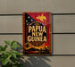 A metal sign with the text "PAPUA NEW GUINNESS" displayed prominently, featuring a bird and tropical landscape.
