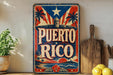 A vintage-style sign with the text "PUERTO RICO" displayed prominently, featuring a red, white, and blue color scheme with a depiction of a fort and palm trees. The sign is placed on a shelf next to a wooden cutting board and a potted plant.