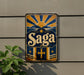 a vintage-style sign with the word "Saga" prominently displayed, along with a sun and mountain motif.