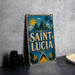 A vintage-style sign for Saint Lucia, featuring a tropical landscape with palm trees, mountains, and a sun.